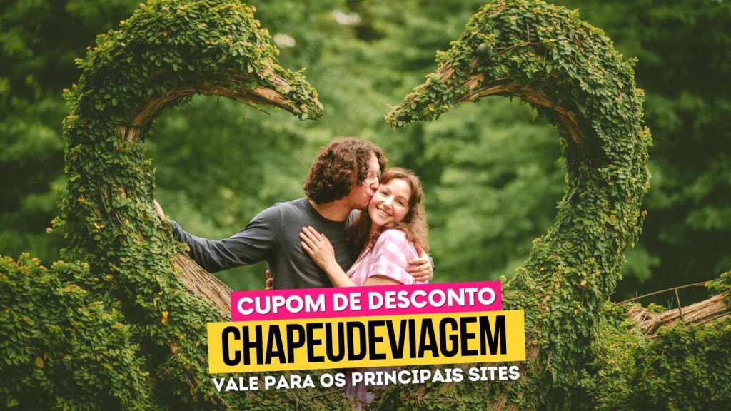 Garden Park Gramado Cupom CHAPEUDEVIAGEM - PH dando beijo no rosto da Andy, os dois no meio dos cisnes